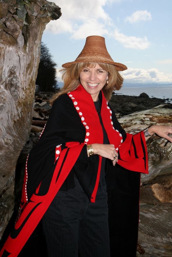Photo of April White in traditional Haida garments.