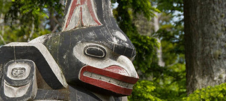 Photo of a Haida carving in Old Massett.